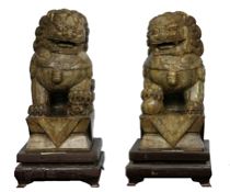 Appraisal: Pair of Massive Jade Foo Dogs Chinese early th Century