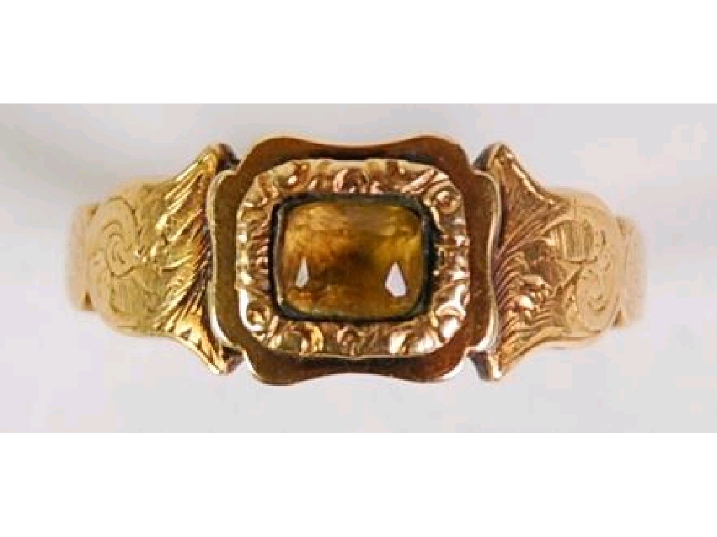 Appraisal: VICTORIAN GOLD RING set with an oblong citrine in chased