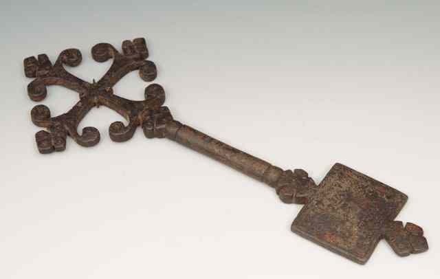 Appraisal: AN ISLAMIC IRON KEY probably th Century with calligraphic inscription