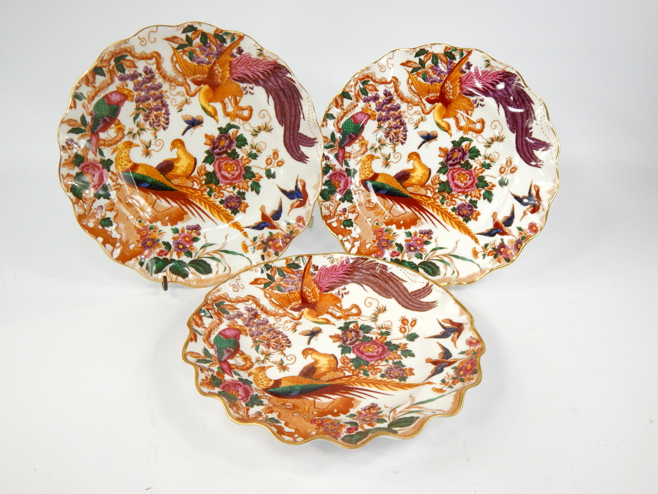 Appraisal: A set of nine Royal Crown Derby porcelain dessert plates