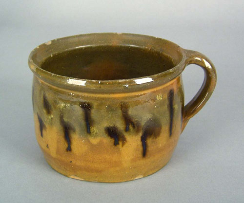 Appraisal: Redware mug th c with orange and green glaze h