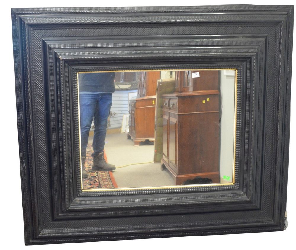 Appraisal: Flemish Ebony Mirror having inch wide rippled moulded ebonized frame