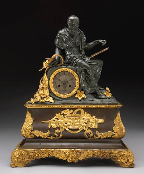 Appraisal: A Napoleon III patinated and gilt bronze figural mantel clock