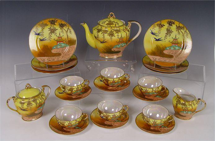 Appraisal: SERVICE FOR HANDPAINTED JAPANESE PORCELAIN DESSERT SET Delicate Emperor yellow