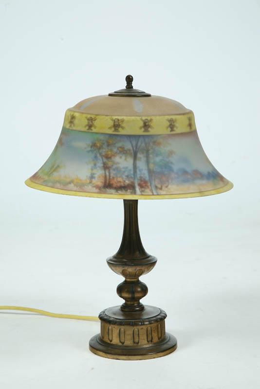 Appraisal: REVERSE PAINTED TABLE LAMP The Pairpoint lamp has an Exeter