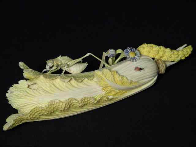 Appraisal: Chinese carved ivory vegetable Depicts a polychrome sprout of cabbage