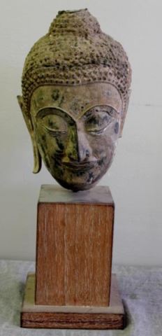 Appraisal: Southeast Asian Bronze Buddha Bust On a custom midcentury stand