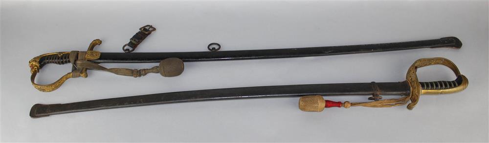 Appraisal: TWO GILT BRASS AND STEEL CEREMONIAL SWORDS each having a