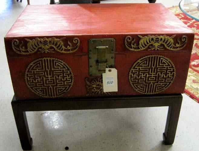 Appraisal: CHINESE RED LEATHER STORAGE BOX ON STAND the lift-top box