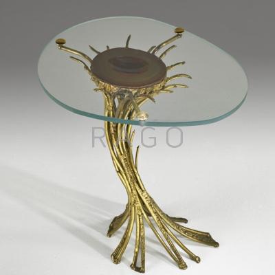 Appraisal: JACQUES DUVAL BRASSEUR Side table France s Welded brass carved