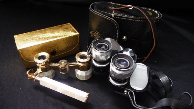 Appraisal: A pair of Tasco x Mod binoculars with case brass