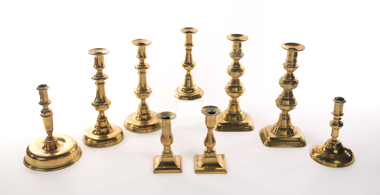 Appraisal: NINE BRASS CANDLESTICKS Eighteenth and th centuries Two dome bases