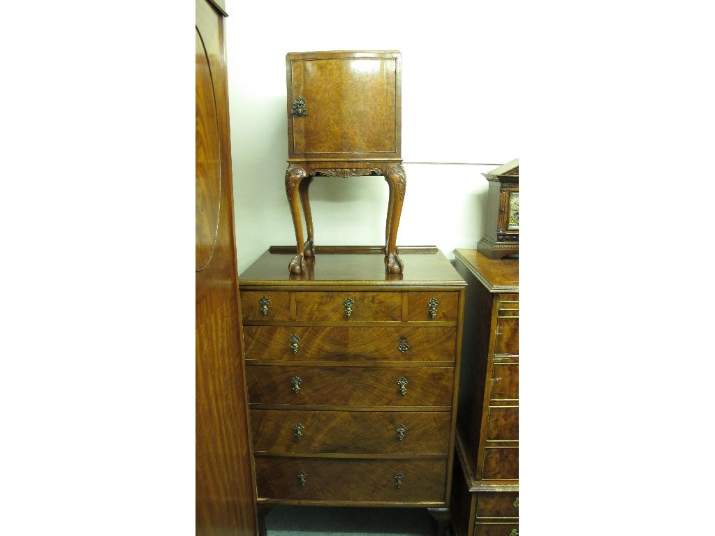 Appraisal: Walnut chest of drawers and a walnut bedside cabinet