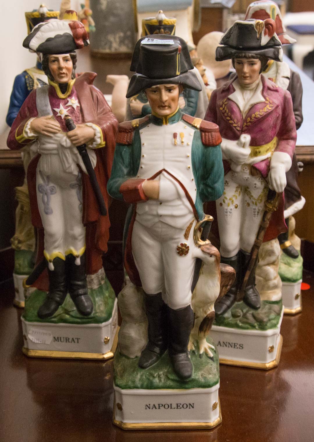 Appraisal: Six Napoleonic theme porcelain decanters