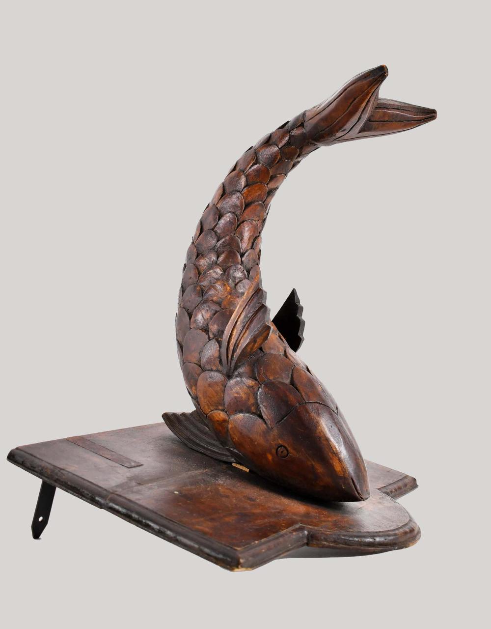 Appraisal: CLASSICAL CARVED WALNUT OAK FISH-FORM BRACKET th Century The scale-carved