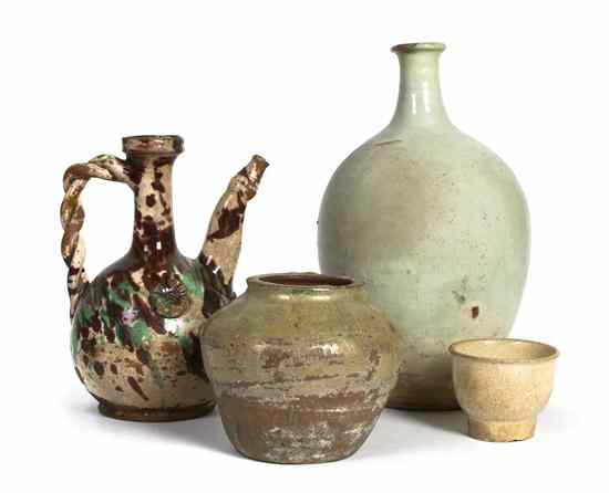 Appraisal: A Group of Four Pottery Articles comprising two Tang and