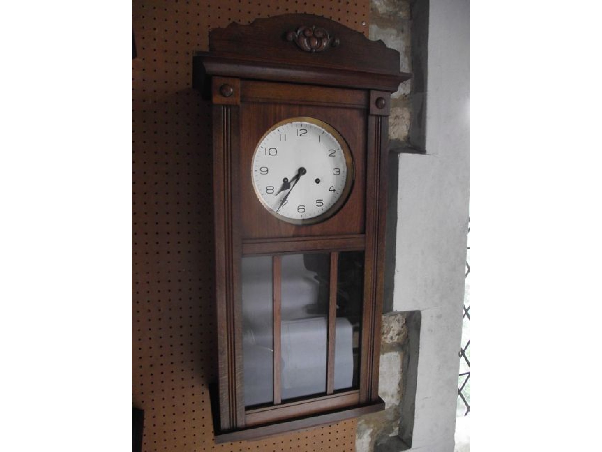 Appraisal: A beech wood wall clock the case with applied mouldings