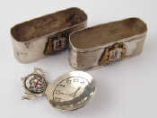 Appraisal: Two silver plated napkin rings each with the enamelled arms