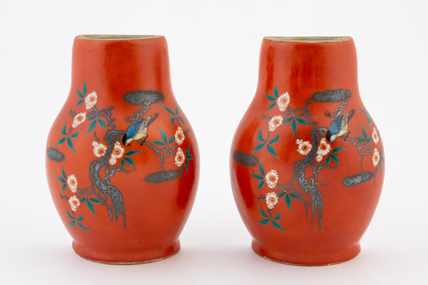 Appraisal: PAIR JAPANESE ORANGE-RED PORCELAIN WALL POCKETS Pair of Japanese red