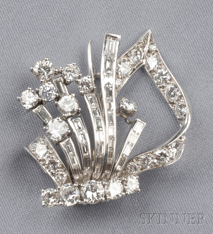 Appraisal: Platinum and Diamond Clip Brooch set with diamond melee and