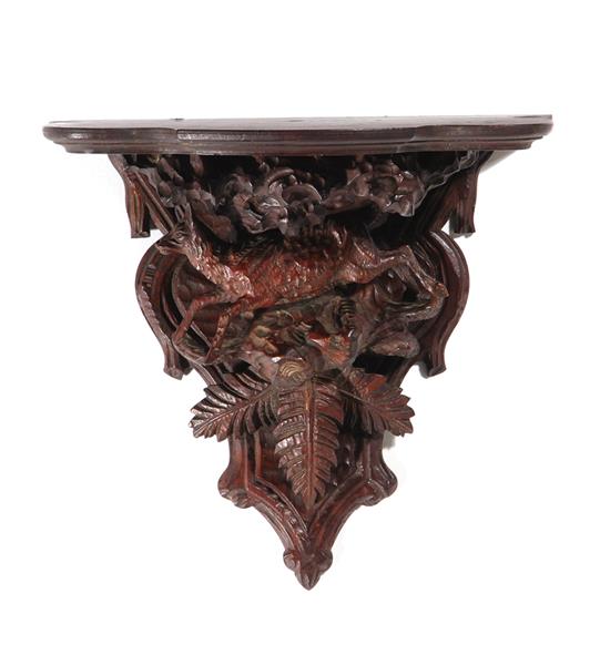 Appraisal: Germany Blackforest carved walnut wall bracket late th early th