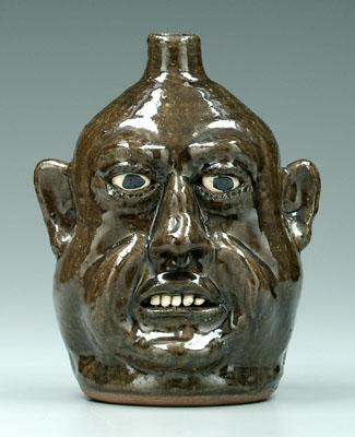 Appraisal: Dated Lanier Meaders face jug distinct cheeks ceramic teeth glossy