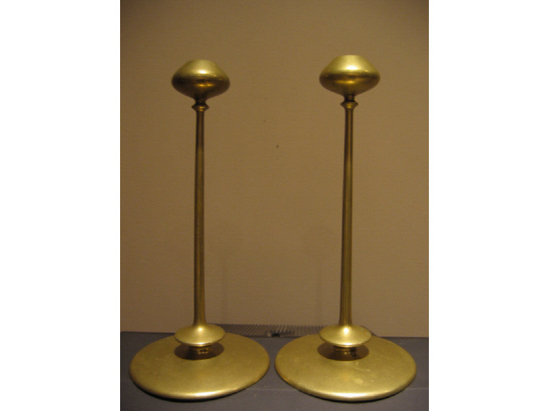 Appraisal: JARVIE BETA pair of gold-tone brass candlesticks incised signature and