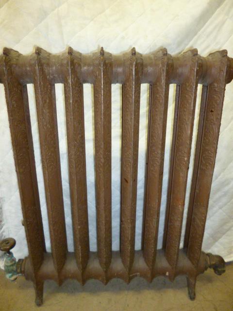 Appraisal: A SET OF THREE CAST IRON RADIATORS c cast with