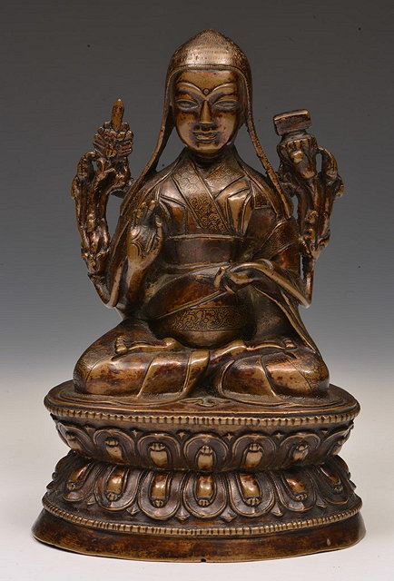 Appraisal: A TIBETAN BRONZE FIGURE of a monk Tsong-kha-pa - th