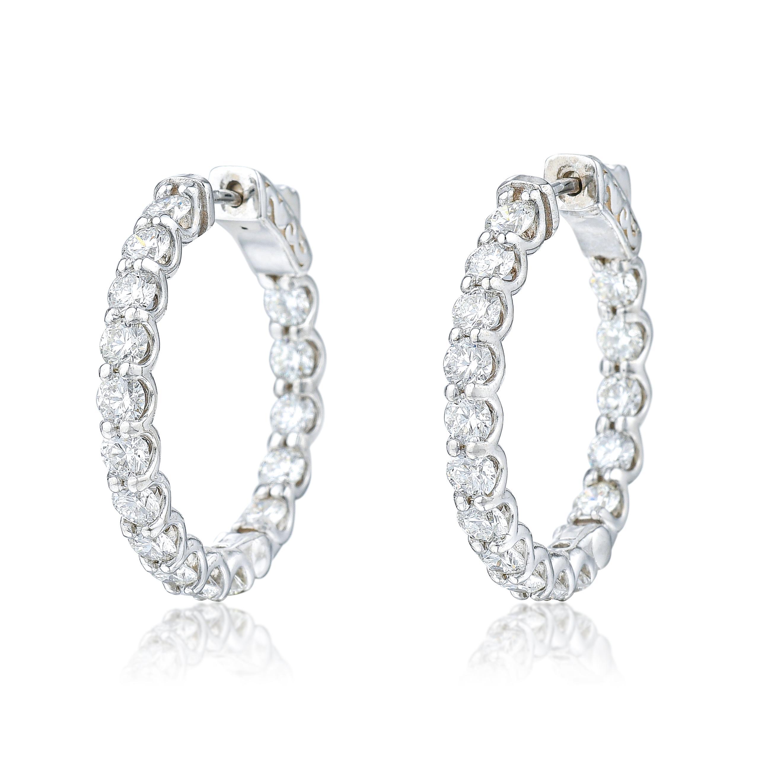 Appraisal: DIAMOND INSIDE OUT HOOP EARRINGS METAL K white gold GEMSTONE