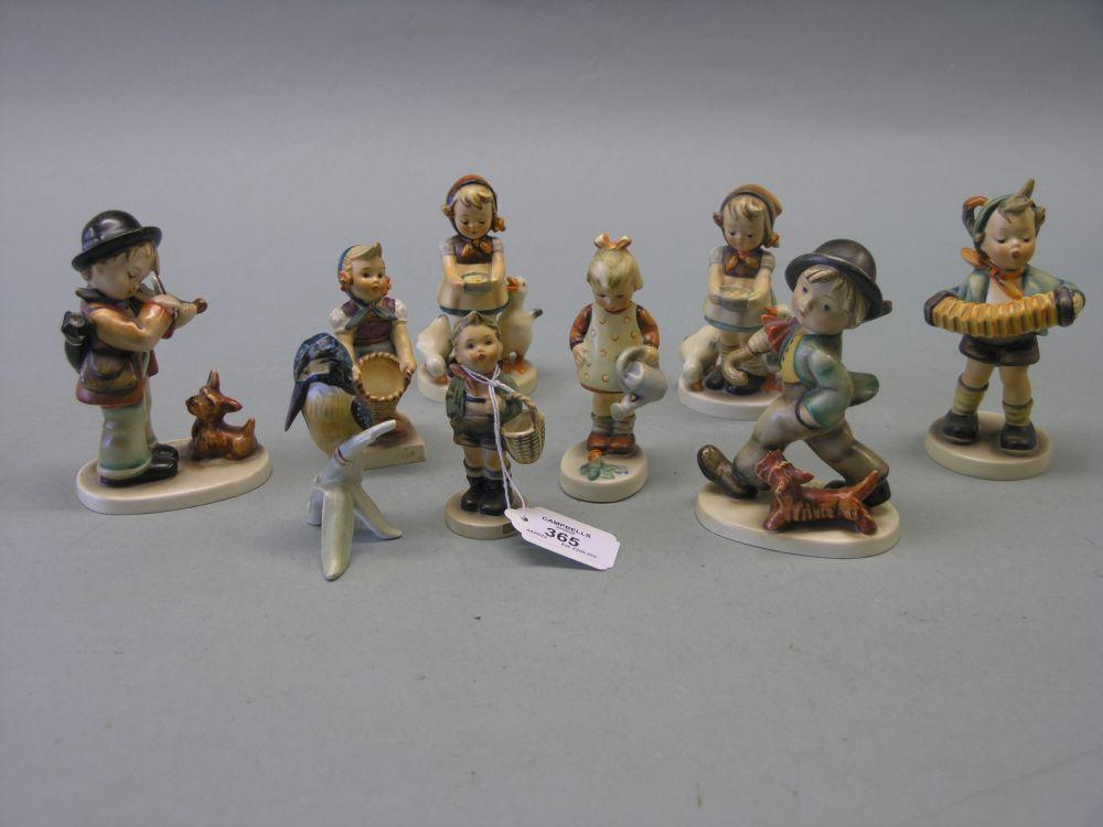 Appraisal: Eight Goebel-Hummel character figures and a Goebel bird model -