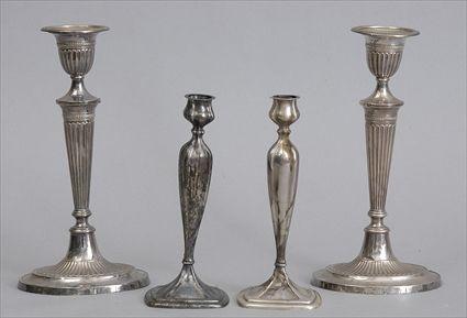 Appraisal: PAIR OF ENGLISH SILVER WEIGHTED CANDLESTICKS AND A PAIR OF