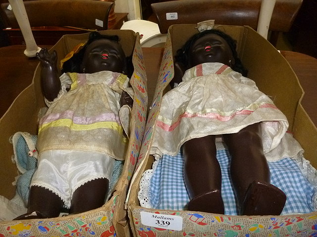 Appraisal: TWO BLACK CHILDREN'S DOLLS each fitted with voice box