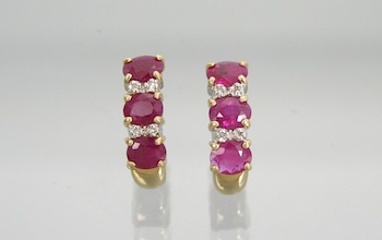 Appraisal: A Pair of Ruby and Diamond Earrings k yellow gold