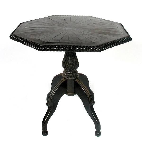 Appraisal: An Anglo Indian carved and ebonized center table height in