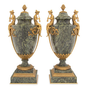 Appraisal: A Pair of French Gilt Bronze Mounted Marble Urns th