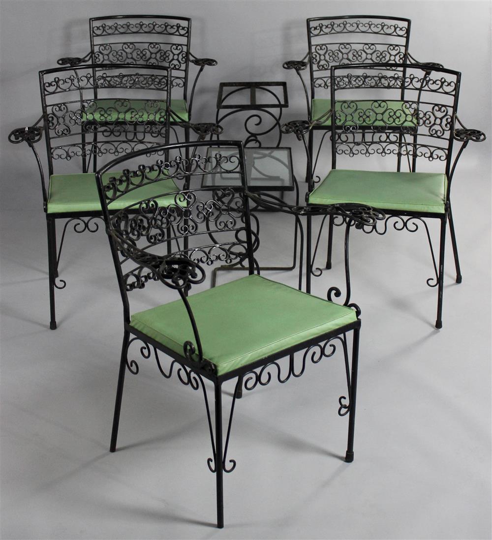 Appraisal: FIVE NEW ORLEANS BLACK IRON GRILLWORK STYLE WROUGHT IRON ARMCHAIRS