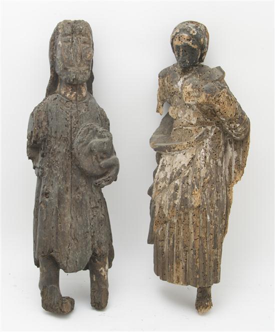 Appraisal: Two Continental Carved Wood Figures th century each depicting a