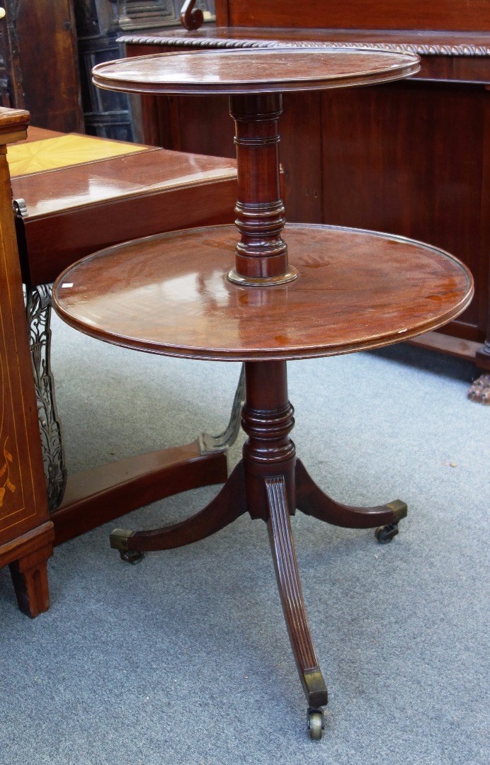 Appraisal: A George III mahogany graduated circular two tier dumb waiter