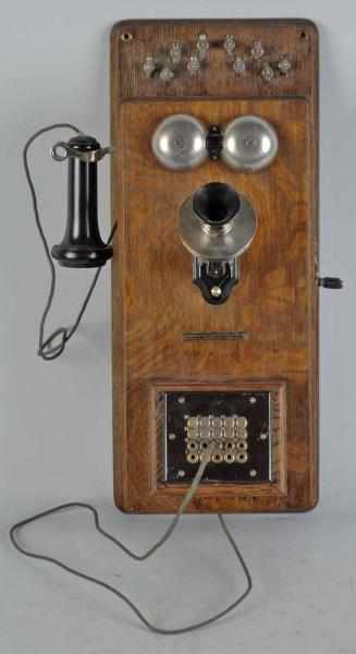 Appraisal: Stromberg-Carlson Switchboard Wall Telephone Description Circa Oak plain front wall