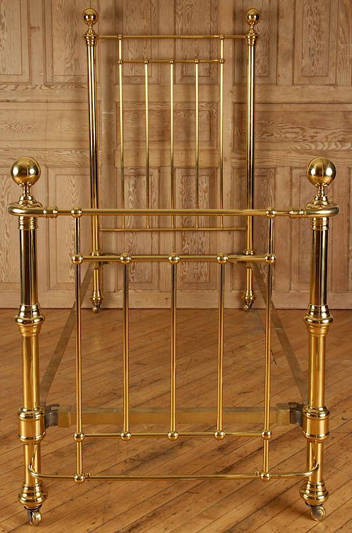 Appraisal: BRASS TWIN BED WITH BALL FINIALS CIRCA A tall single