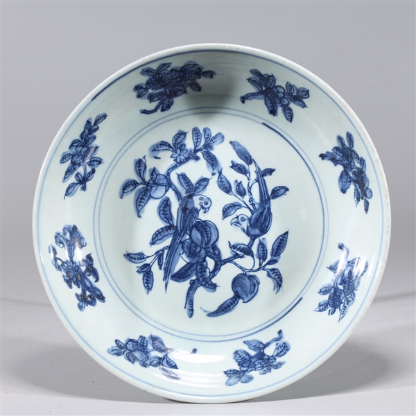 Appraisal: Chinese blue and white porcelain bowl with bird and fruit