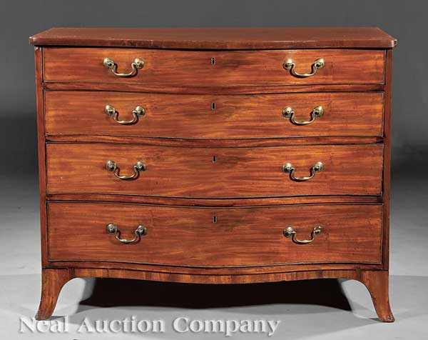 Appraisal: A George III Mahogany Serpentine Chest c four graduated drawers