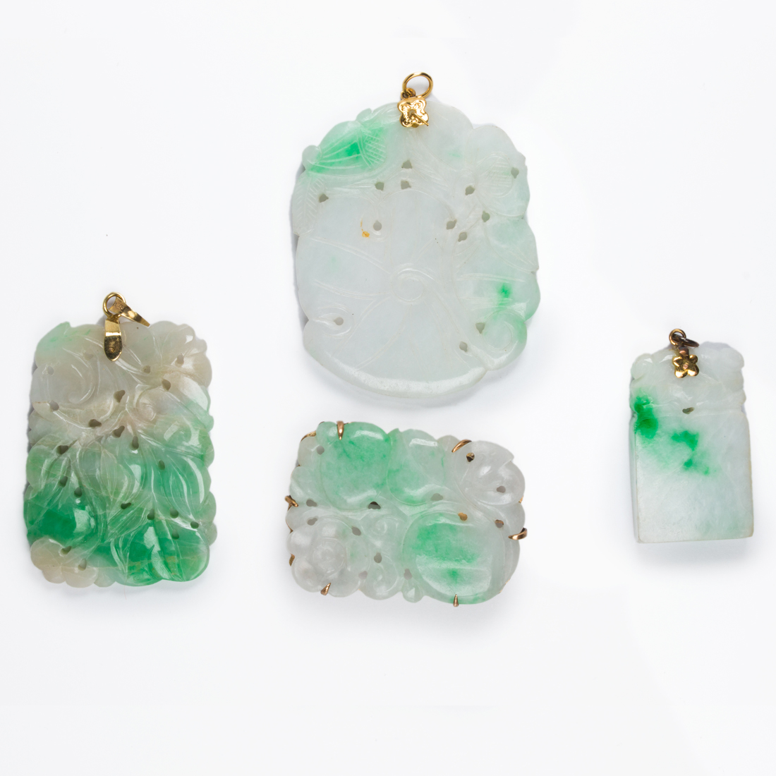 Appraisal: LOT OF JADEITE PENDANTS lot of Jadeite pendants comprising three