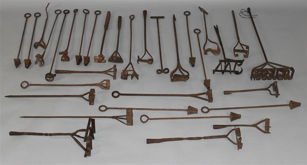 Appraisal: LARGE ASSORTMENT OF WROUGHT IRON BRANDING IRONS approximately branding irons