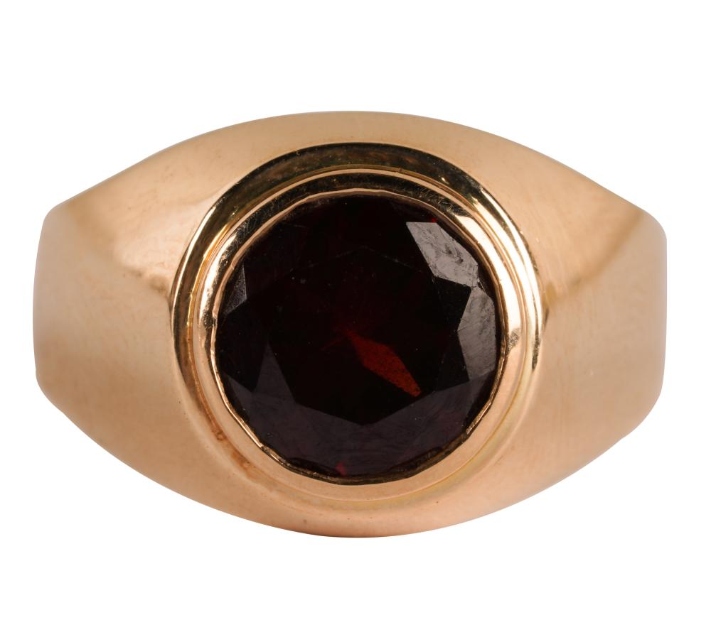 Appraisal: KARAT YELLOW GOLD GARNET RINGcentering one round garnet weighing approximately