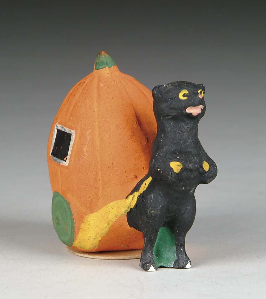 Appraisal: GERMAN PUMPKIN W CAT CONTAINER All-original composition figural candy container