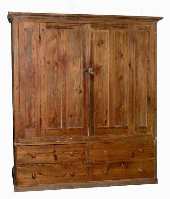 Appraisal: A LARGE VICTORIAN PINE COUNTRY CUPBOARD the twin two panelled