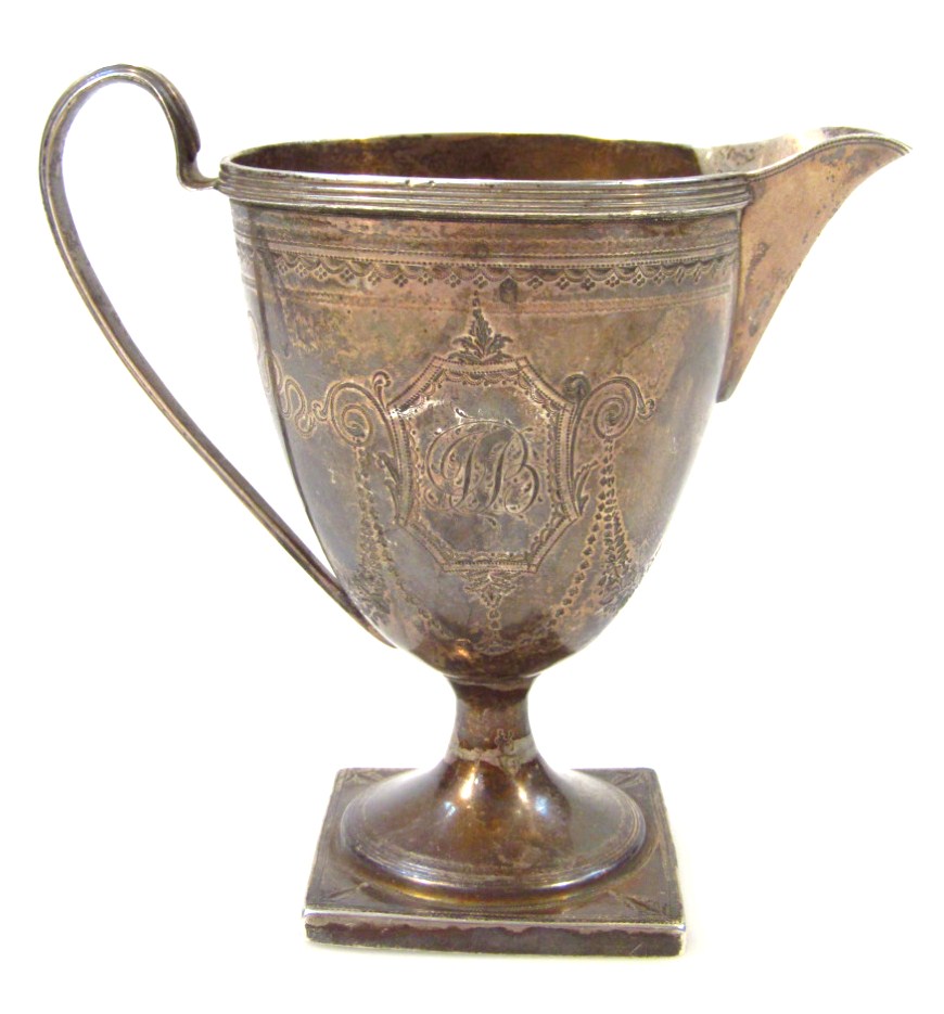 Appraisal: A thC silver cream jug the goblet shaped bowl with