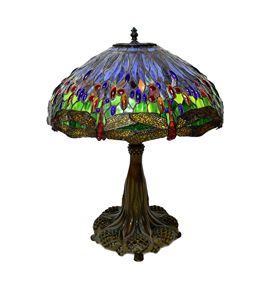 Appraisal: A bronze and coloured glass Tiffany style table lamp late